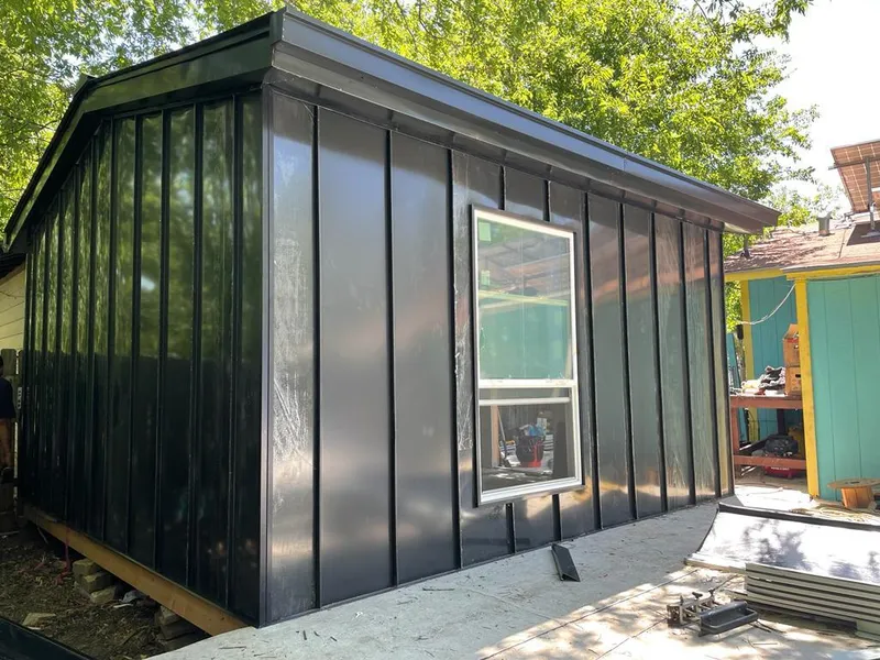 Black standing seam metal wall panels for Roof Inspection in Dixon