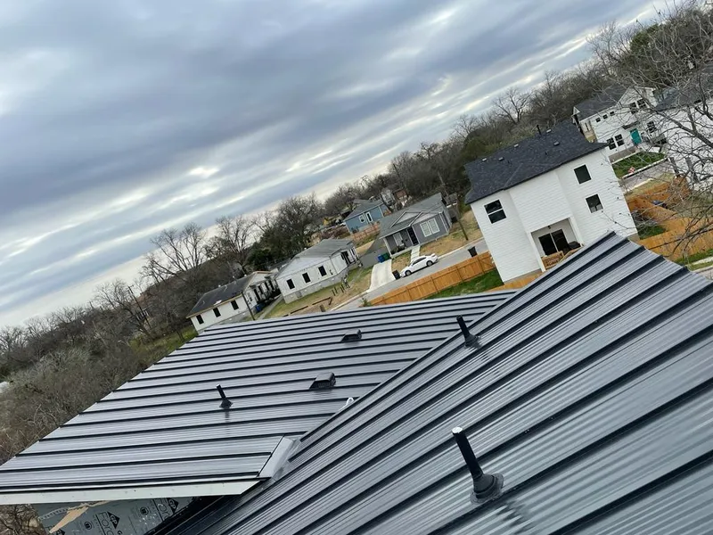Standing seam metal roof panels with vents for Skylight Repair in Dixon